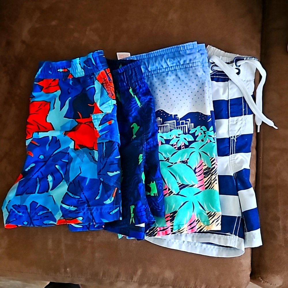 Bundle 4 swim trunks - like new!